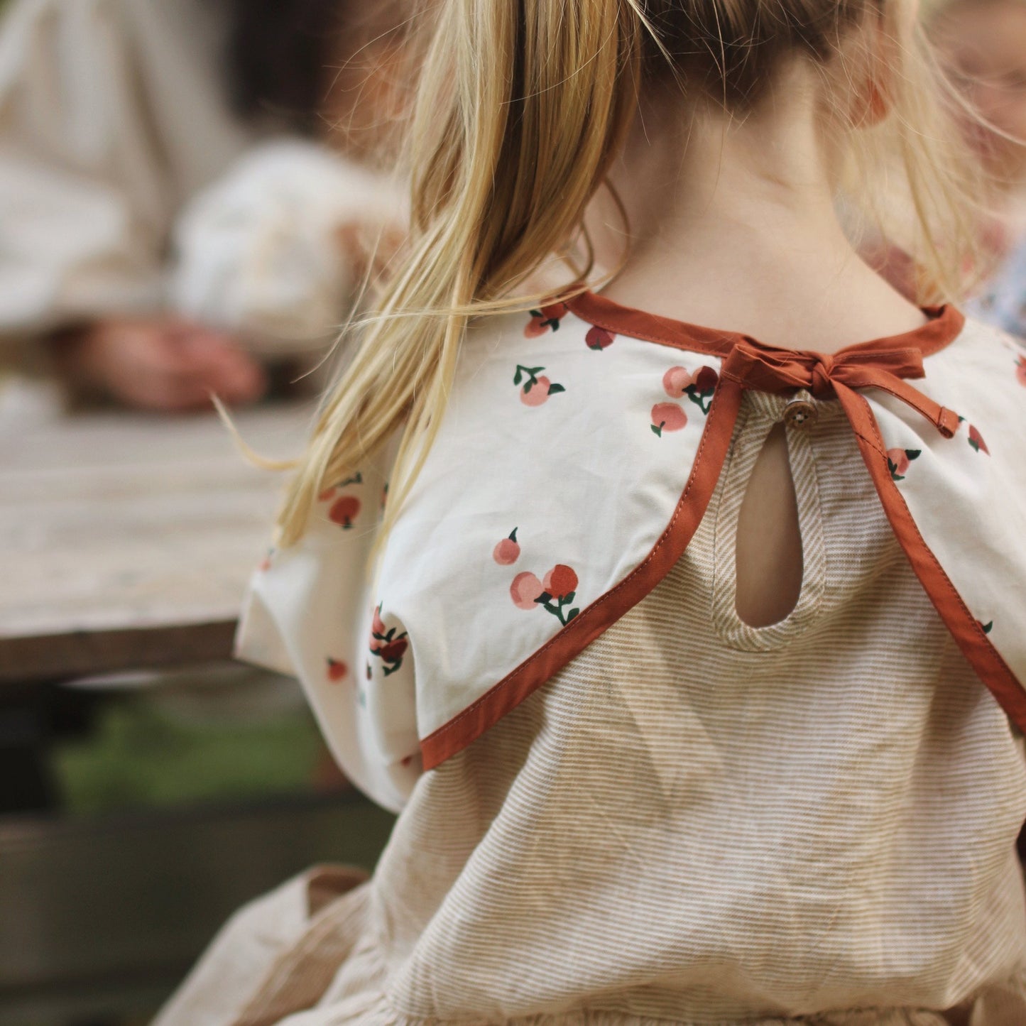Avery Row - Sleeved Bib (Peaches) - back