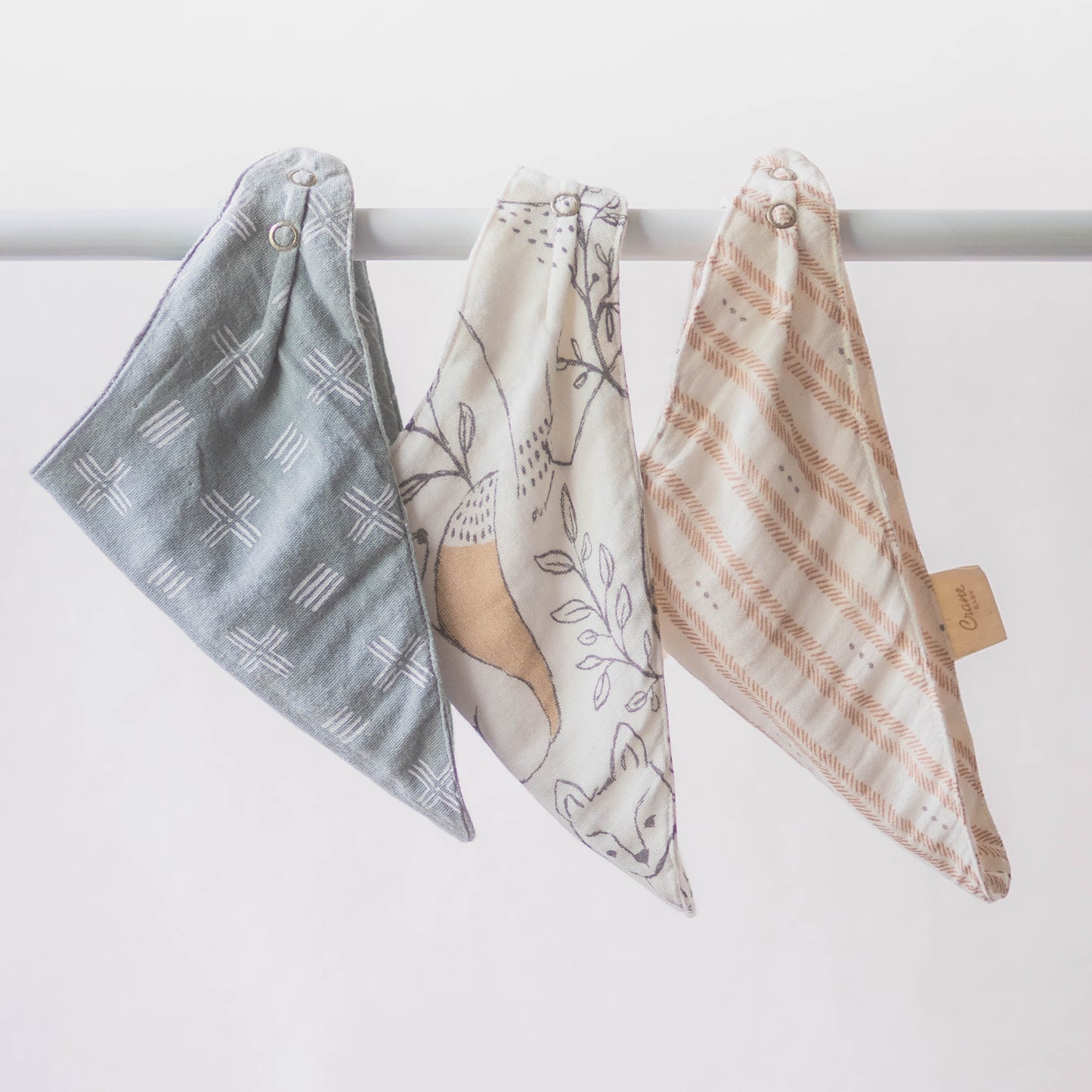 Crane Baby Bibs (Ezra) - hanging - dribble bibs