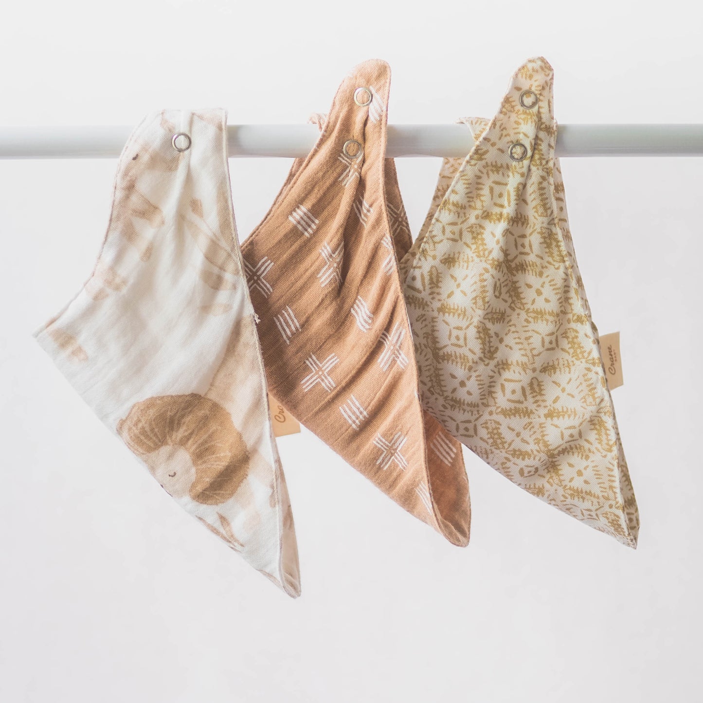 Crane Baby Bibs (Kendi) - hanging