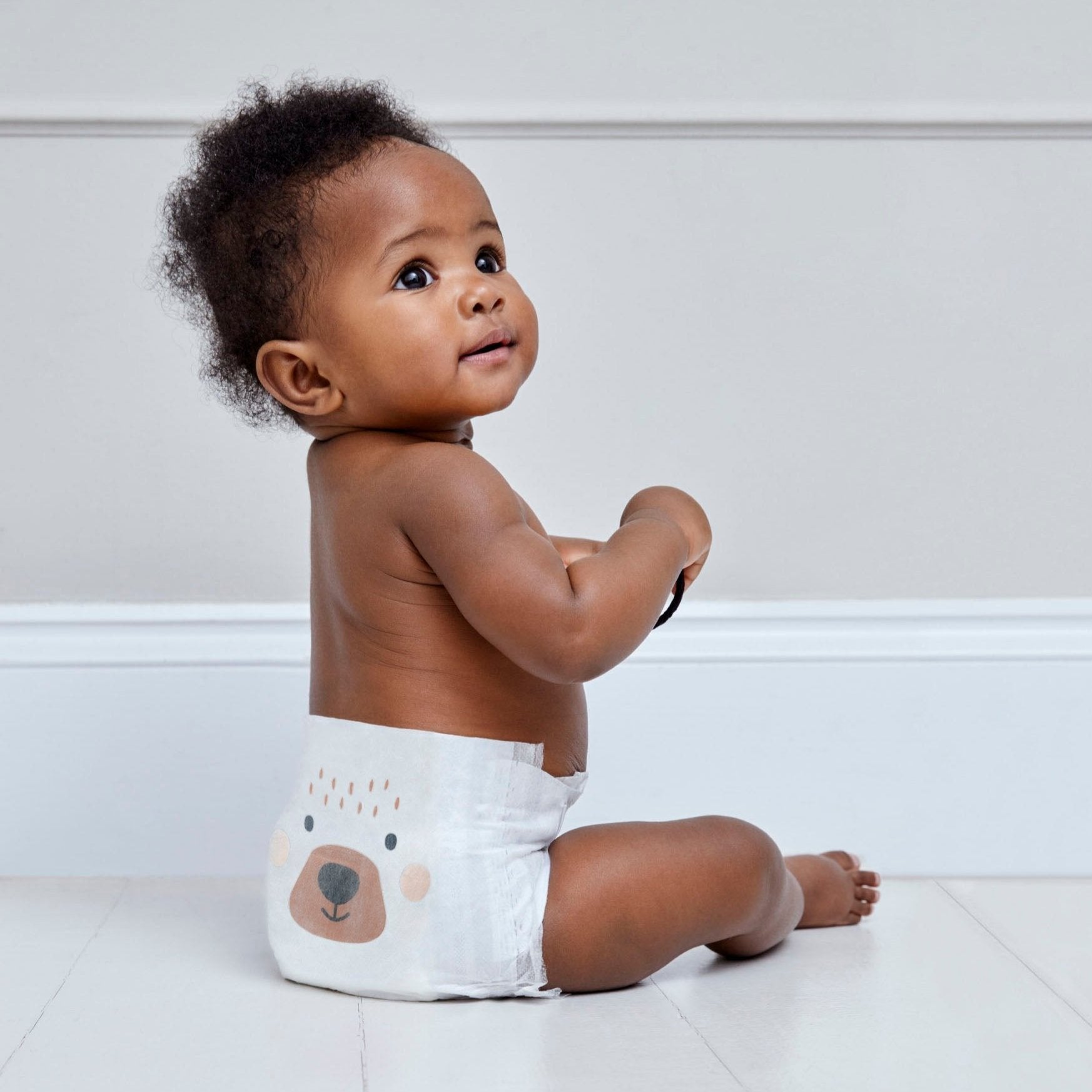 Kit & Kim nappy size 3 - boy on floor - diapers