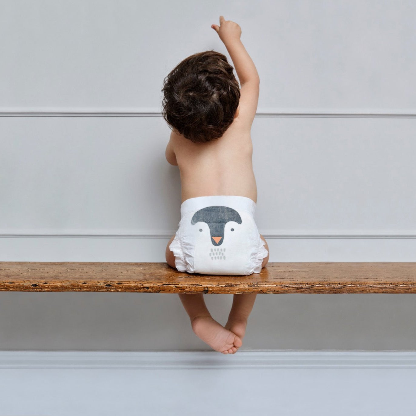 Kit & Kin nappies - size 6 - boy on bench - organic nappies