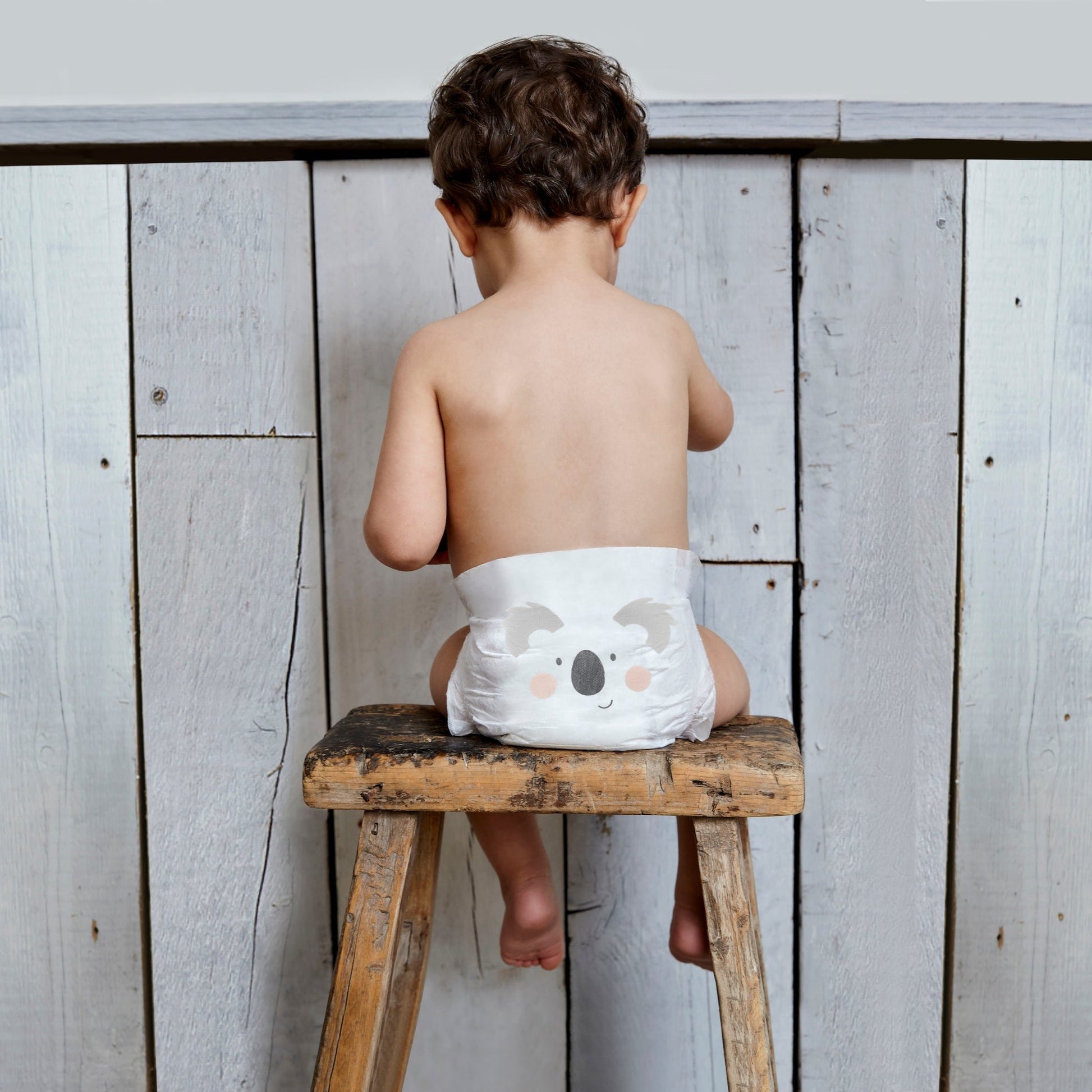 Kit & Kin - nappy size 5 - boy on stool - eco nappies