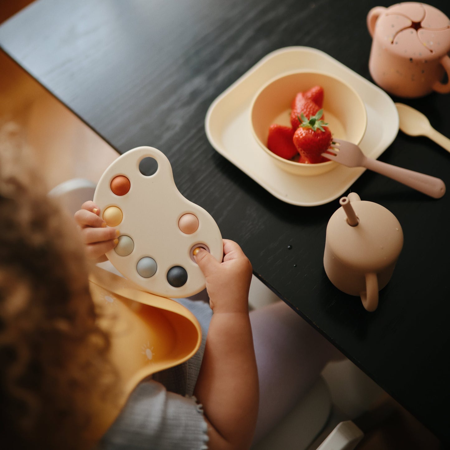 Mushie - Paint Palette Press Toy - girl at dinner table