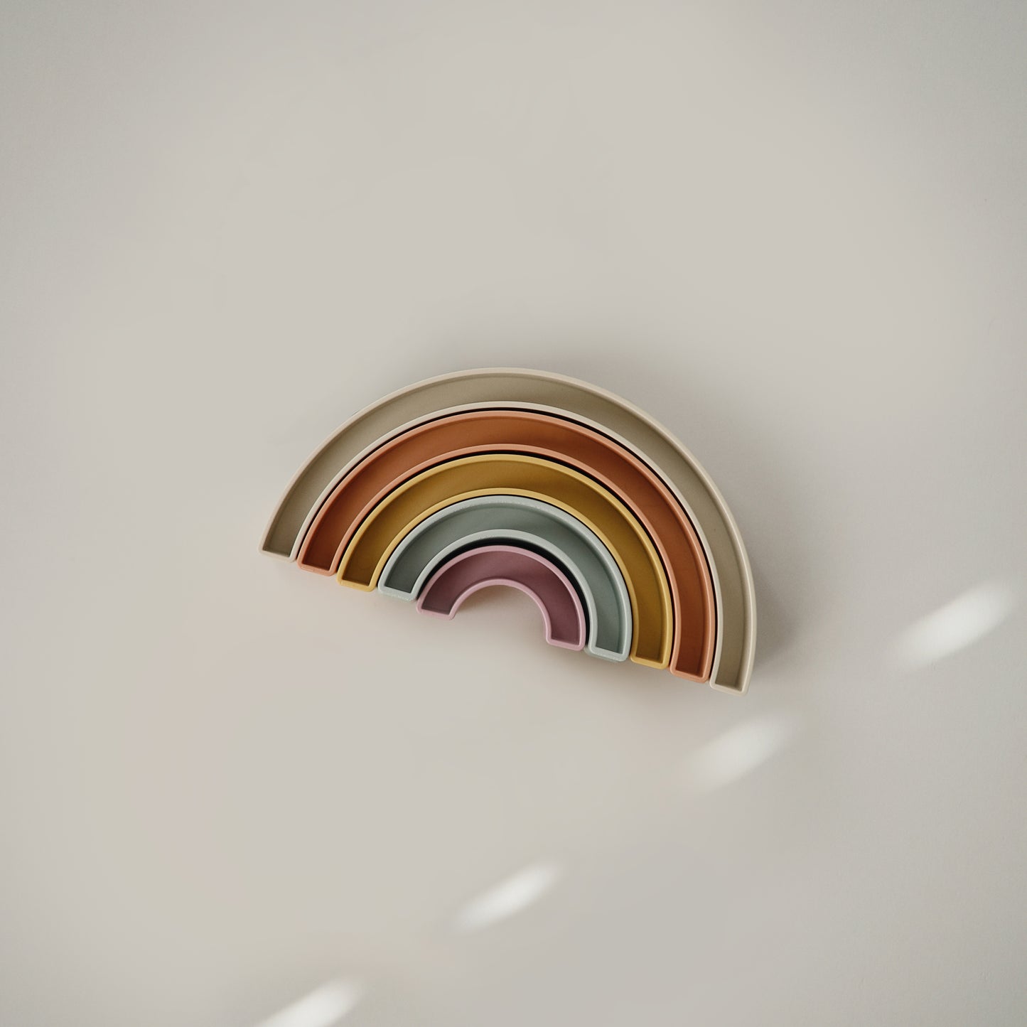 Mushie - Stacking Rainbow Toy - Tropical - close up