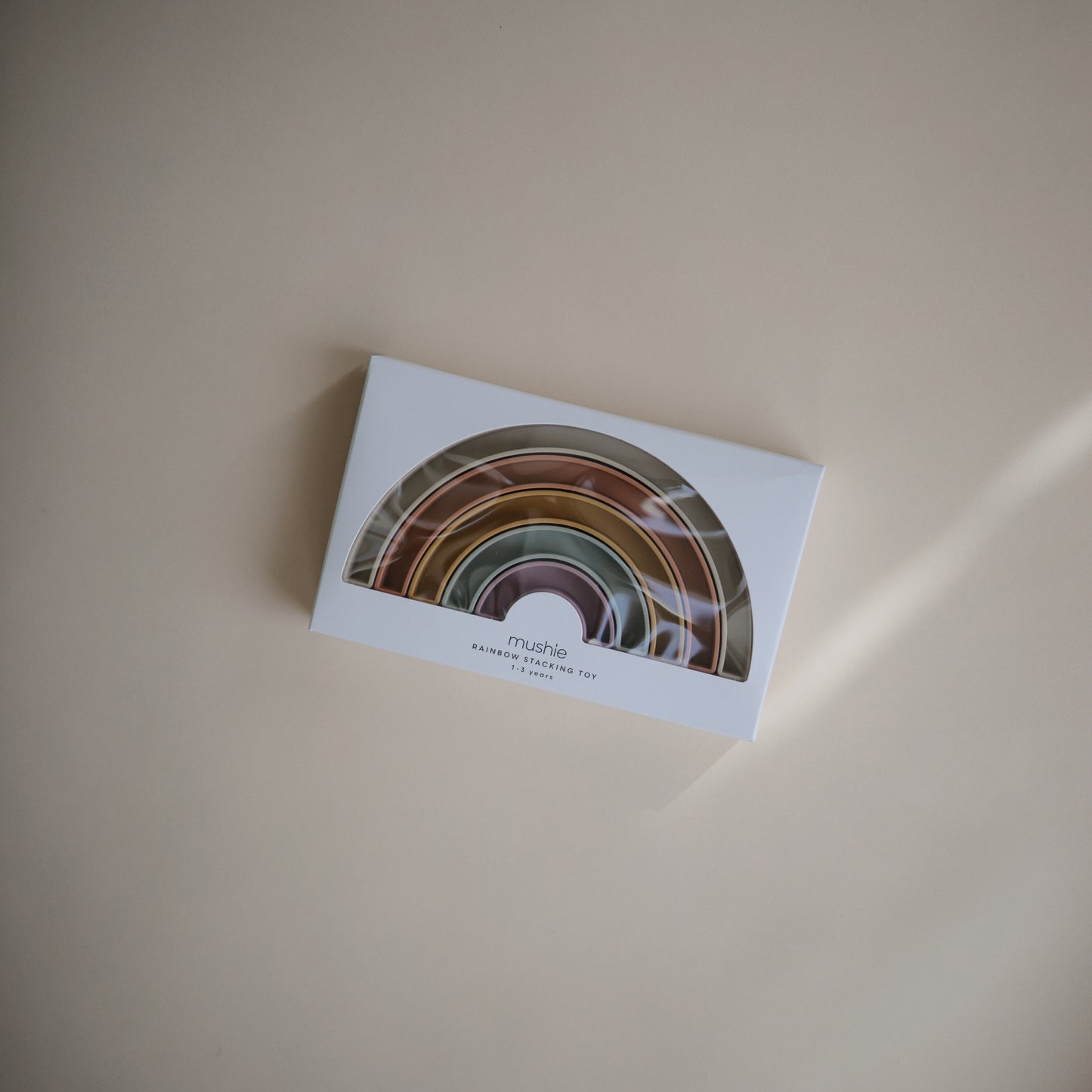 Mushie - Stacking Rainbow Toy - packaging