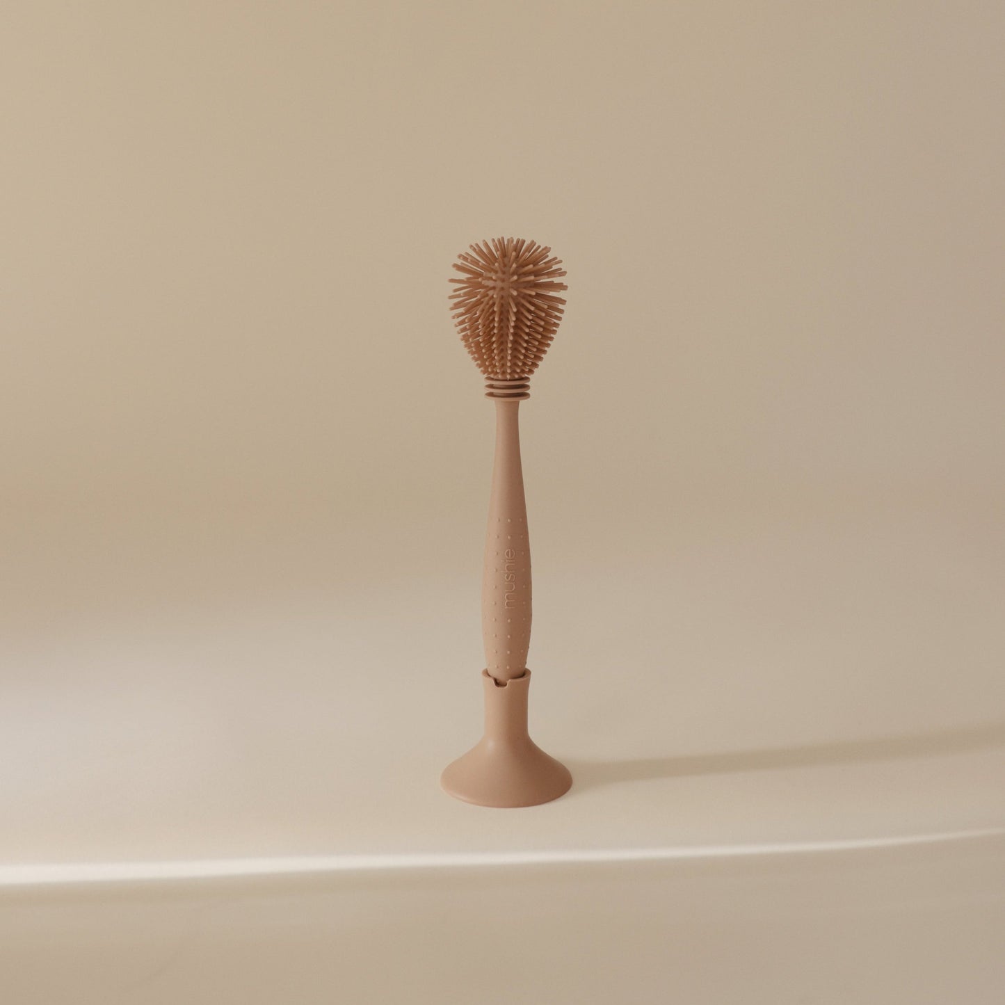 Mushie - Baby Bottle Brush - Natural with background