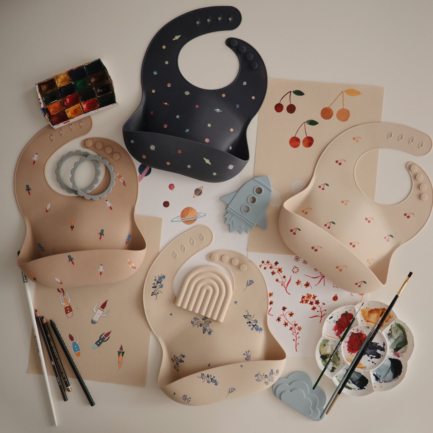 Mushie - Baby Silicone Bib - Planets - art