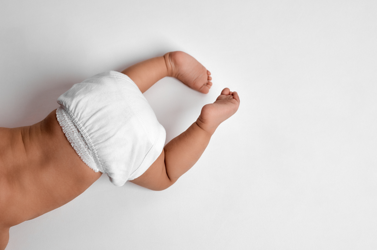 baby in nappy crawling birds eye view