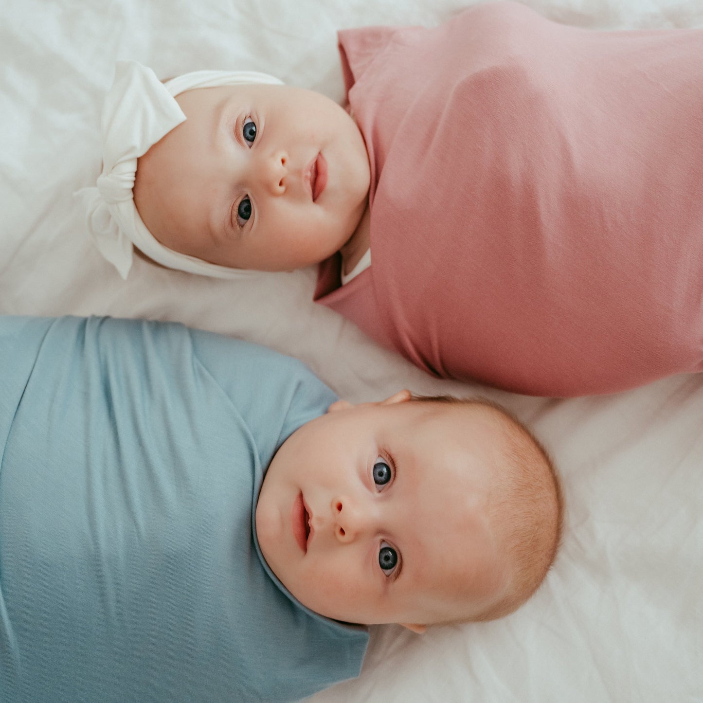 Anvi Baby - Newborn Swaddle, Hat & Sleepsuit Set (Blue) - babies together side