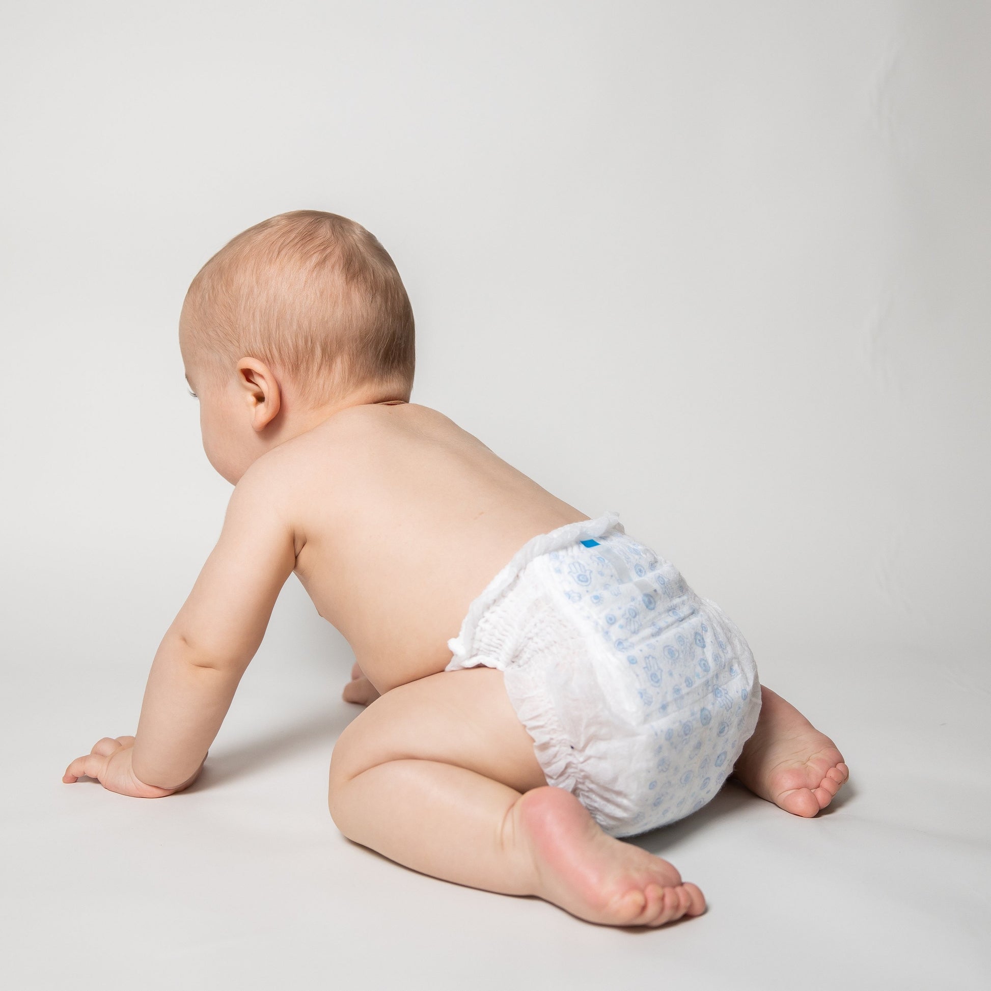 Kim & Kimmy Pull Up Pants Nappies (Good Vibes) - evil eye and hamsa hand baby crawling