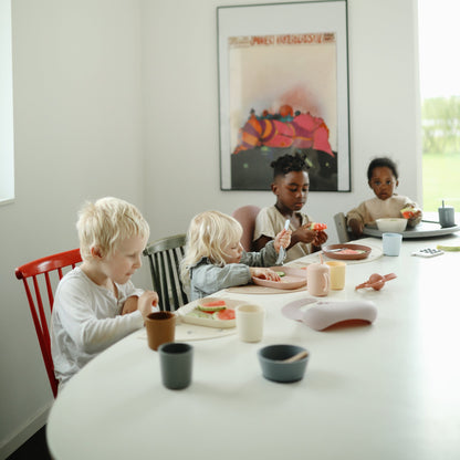 Mushie - Silicone Place Mat - kids at dinner table - baby led weaning table mat